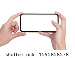 hand holding phone taking photo with mobile smartphone isolated on white background./Mock-up smartphone