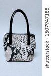 Small photo of Grey bag for women with reptile imitation leather and zip closure