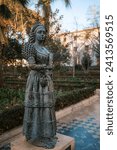 Small photo of RONDA, SPAIN - DECEMBER 27 2023: Dama Goyesca sculpture, Alameda del Tajo Park. Every year several women are chosen to be Damas Goyescas and resemble the ladies seen in Goya paintings of bullfighting.