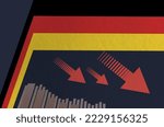German flag on the background of financial charts. Economic crisis in Germany