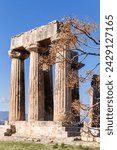 Small photo of Temple of Apollo in Ancient Corinth. Close up view of Doric colonnade, winter time. Ancient sanctuary at Peloponnese peninsula. Corinth, Greece