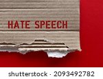 Small photo of Torn cardboard paper with text HATE SPEECH on red background, concept of expression which speakers intend to humiliate or promote hatred, violence and discrimination against group or class of persons