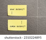 Small photo of note on wall with handwritten text GIVE RESPECT EARN RESPECT with two ways arrows , means respect is earned or received by giving it to others, everyone deserves to be respected