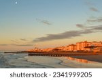 Small photo of Lido di Jesolo,Veneto,Italy-February 9th 2015:Beach and hotels of Lido di Jesolo lit by the first sun rays -popular resort at Adriatic Sea near Venice