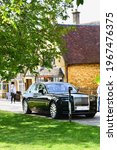 Small photo of Broadway,Worcestershire, England - 4.23.21: An elegant modern Rolls Royce is parked up in the genteel countryside village of Broadway.