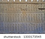 Small photo of Bas-reliefs of marching Midian and Persian warriors decorating walls of Apadana palace in Persepolis, ex capitol of Persia. This open air museum is located near Shiraz, Islamic Republic of Iran