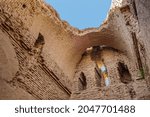 Small photo of View of the sky from the hall through a hole in the collapsed ceiling. Medieval palace or caravanserai Kyr Kyz, Termez, Uzbekistan. Built in the 9th century