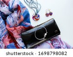 Women's fashion and style. Fashionable women's accessories. handbag, scarf, original jewelry. pendant, earrings and rings