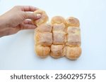 Delicious Freshly baked sweet bun Butter,brown butter bread luscious with sugar isolated on white backdrop