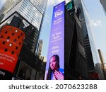 Small photo of New York City, New York United States - August 29 2021: Spotify Alex Isley popstar blue billboard advertisement in Times Square with logo.