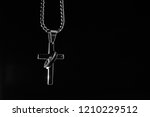 silver cross in the dark | Shutterstock . vector #1210229512