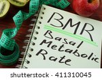 Small photo of BMR Basal metabolic rate written on a notepad sheet.