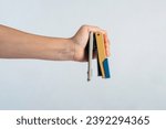 Small photo of stapler, view side stapler with hand pressed on white background.