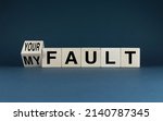 Small photo of My fault or your fault. Cubes form words My fault or your fault. Concept of problems and conflicts in business and society. Social problems