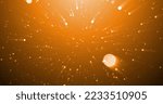 Small photo of Image of falling confetti and light rays over orange background. Background, lights and movement concept digital generated image.