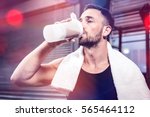 Muscular Man Drinking Protein...