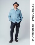 cool senior man wearing a black ... | Shutterstock . vector #1989050168