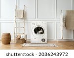 washing machine in a japandi... | Shutterstock . vector #2036243972