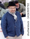 Small photo of CANNES, FRANCE - MAY 15: Rithy Panh attends the photo-call for the Camera D'or Jury during the 72nd Cannes Film Festival on May 15, 2019 in Cannes, France.