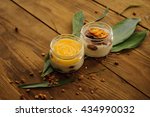 tiramisu and lemon custard desserts on wooden background