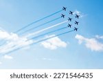 Squadron of planes fly with color trail lines of Finland Israel Greece Honduras Argentina Micronesia Guatemala or El Salvador over clouds and clear sky