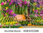 Wood Chair In The Flowers...