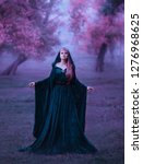 Small photo of charming maiden in a blue brakhatny cloak in a wide belt, with pink hair in the forest as a sacrifice for the devil. the bloodthirsty dark druid conducts the rite of sacrifice, cold violet colors