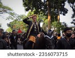 Small photo of Deputy Mayor of Bogor Dedie Rachim rides a horse while saluting residents at the 541st anniversary of Bogor in the Jalan Sudirman area, Bogor City, Bogor June 5, 2023