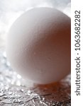 Small photo of Small pin hole on the edge of egg shell for easy to peel