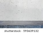 Stone table top and background of grey old concrete wall - can used for display or montage your products.