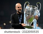 Small photo of Pep Guardiola head coach of Manchester City celebrates after winning the UEFA Champions League 22-23 final match between FC Internazionale and Manchester City FC at Atatuerk Olympic Stadium on June 10 23