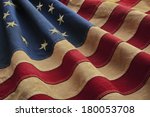 Old American flag designed during the American Revolutionary War features 13 stars to represent the original 13 colonies. According to the legend the original Betsy Ross flag was made on July 4, 1776.