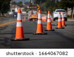 Traffic Cones On Road With...