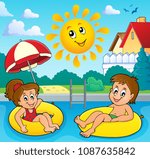 children in swim rings image 3  ...