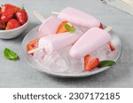 Refreshing Strawberry Popsicles, Ice Lolly with Fresh Strawberry and Mint on Bright Background, Healthy Dessert