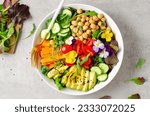 Vegan Buddha Bowl with Chickpeas, Avocado and Fresh Vegetables, Healthy Eating, Tasty Vegetarian Meal