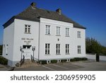 Small photo of Roskilde, Denmark - May 8, 2023 Odd Fellow Palaeet, The Odd Fellow mansion. Older white building with blue sky in the background. Co-owned by various Odd Fellow lodges in Roskilde.