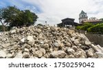 Small photo of Rubble from a partially destroyed church. Facade of building completely obliterated. Caused by an earthquake in Bohol.