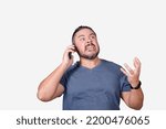 Small photo of A fuming mad man arguing with a customer service representative over the phone. A livid guy making threats. Isolated on a white backdrop.