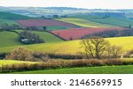 Small photo of Fields and Meadows over English Village, Berry Pomeroy, Devon, England, Europe