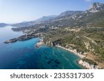 Small photo of Aerial bird's eye wide angle view of Karaburun peninsula and its magnificent bays. Karaburun Peninsula is located west of the city of Izmir, comprised wholly within Izmir Province, Turkey.