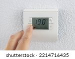 Thermostat is manually lowered to a temperature of 19 degrees Celsius.