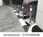 Bollards made of stainless steel chrome for protection of property from moving vehicles in roadside in front of mall entrance
