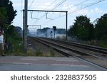 Small photo of Holsbeek, Vlaams-Brabant, Belgium July 8, 2023: several fires along the railway caused by the wind or an arsonist