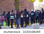 Small photo of Milwaukee, Wisconsin USA - October 29th, 2022: Many Democrat voters lined up at North Division High school to participate at Governor Tony Evers, Mandela Barnes and Barack Obama Democratic party rally