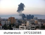 Small photo of Israeli air strikes on residential buildings and towers in Gaza City, on May 12, 2021. At least 35 people were killed in Gaza and five in Israel as tensions have escalated in the region.