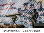 Small photo of Palestinian fighters of the military wing of Palestinian Islamic Jihad, attend a a rally marking Palestinians commemorate Israel's war on Gaza in May last year, in Gaza Strip, on May 18, 2022.