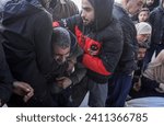 Small photo of Palestinians bid farewell to their relatives who were killed during an Israeli air strike at Al-Najjar Hospital, in the city of Rafah in the southern Gaza Strip, on January 10, 2024.
