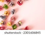 Small photo of Frozen ice cubes with various fruits, blackberries and raspberries, gooseberries and currants, blueberries and mint, top view