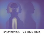 Small photo of bipolar mental disorder. Double face. Split personality. Conceptual mood disorder. Dual personality concept. 2 silhouettes of a female head. mental health. Imagination.